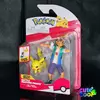 pokémonos játékfigura ash és pikachu